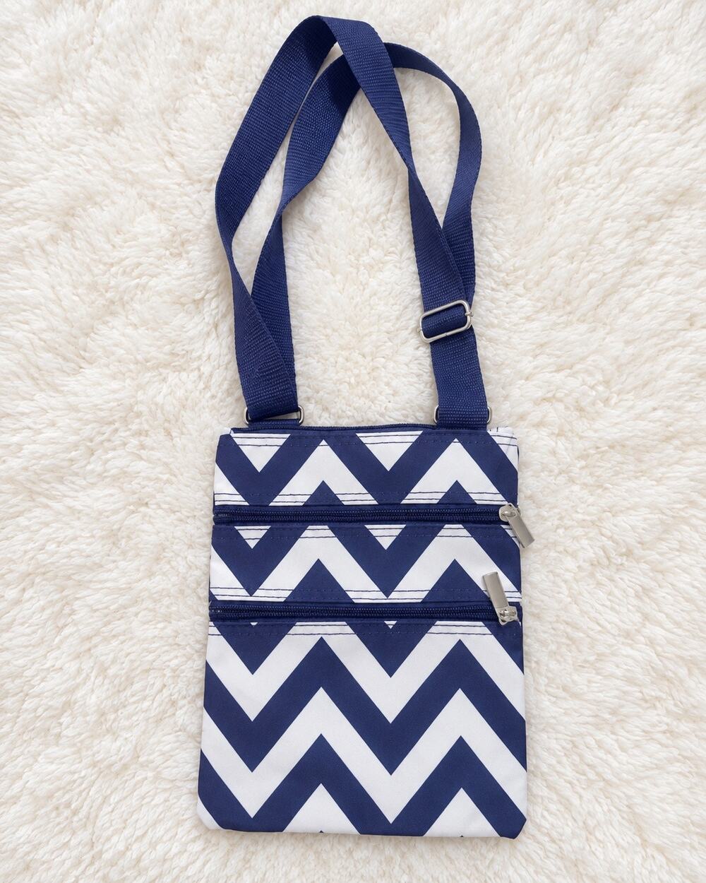 Cute navy blue and white chevron crossbody bag with an adjustable strap